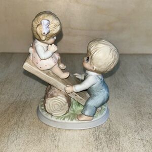 Homeco #1406 boy and girl on seesaw